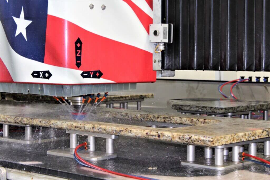 CNC machine cutting a slab